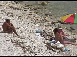 cadela Cuckold na praia